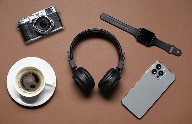 Camera, headphones, smartwatch and phone